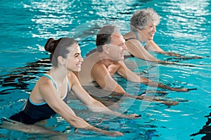 Seniors cycling on aqua bike