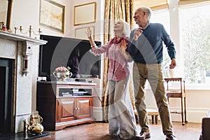Seniors Dancing At Home