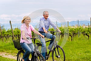 Seniors exercising with bicycle