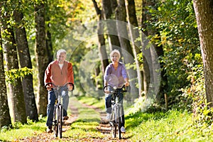 Seniors exercising with bicycle