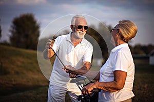 Seniors golfers on the filed talking