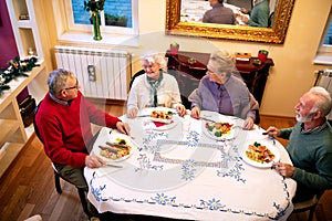Seniors having a delicious dinner