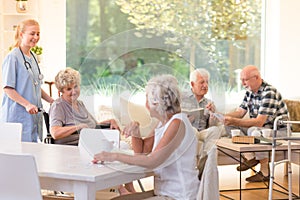 Seniors in living room photo