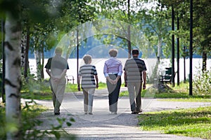 Seniors out walking at park