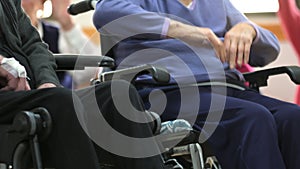 Seniors patients doing exercises in a retirement home.