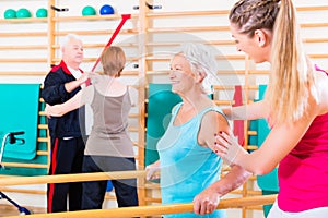 Seniors in physical rehabilitation therapy