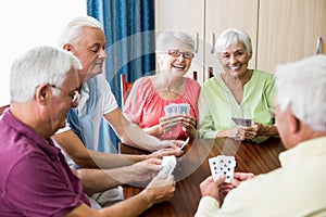 Seniors playing cards together