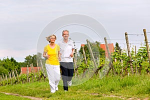 Seniors running in the nature doing sport