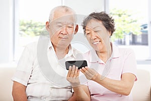 Seniors watching the smart phone