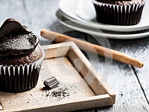 Sensational Chocolate Delight: Chocolate-covered Cupcake with Irresistible Topping