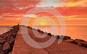 Sensational red sunrise skies at the Breakwall photo