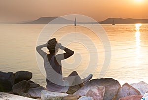 Sensational sunset delight woman at Balaton lake