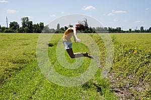 Sense of freedom. happy girl jump high. full of happiness. fly away in dreams. summer activity of woman in field. sport and