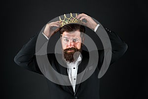 Sense of self importance. Big boss. King crown. Egoist concept. Businessman in tailored tuxedo and crown. Very important