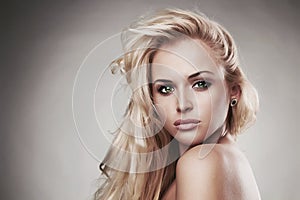 Sensitive Beautiful blond woman.hairstyle.salon care.sexy young girl. close-up portrait. green eyes photo