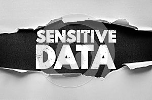 SENSITIVE DATA text on torn paper background. Cybersecurity, privacy, confidentiality, protection, and information safety concept