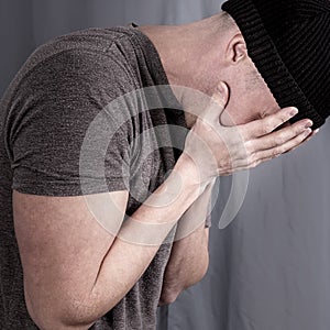 Sensitive image with a masculine man crying