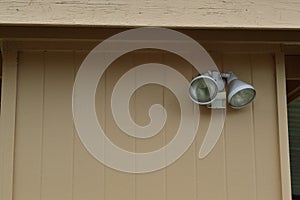 Sensitive motion-detecting outdoor security light on garage