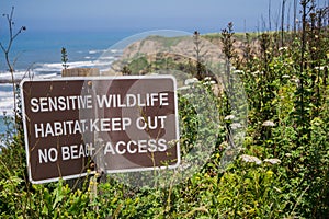 `Sensitive wildlife habitat` posted sign