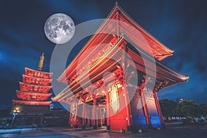 Sensoji is an ancient Buddhist temple with full moon at night in Asakusa, Tokyo, Japan. Elements of this image furnished by NASA