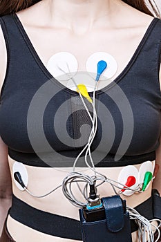 Sensors and recorder of Holter monitor on body photo