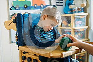 Sensory Activities for kids with disabilities. Preschool Activities for Children with Special Needs. Boy with with