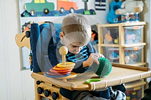 Sensory Activities for kids with disabilities. Preschool Activities for Children with Special Needs. Boy with with