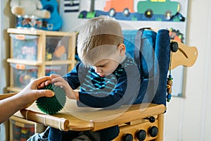 Sensory Activities for kids with disabilities. Preschool Activities for Children with Special Needs. Boy with with