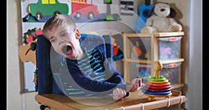 Sensory Activities for kids with disabilities. Preschool Activities for Children with Special Needs. Boy with with