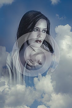 Sensual, Beautiful woman in clouds, mithology concept. Brunette