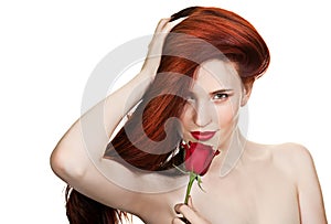 Sensual beautiful woman with red rose