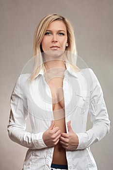 Sensual blond girl in white chemise photo