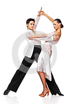 Sensual couple dancing salsa. Latino dancers in action