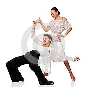 Sensual couple dancing salsa. Latino dancers in action. Isolated