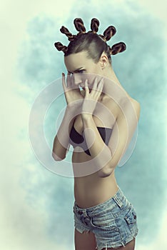 Sensual girl with creative hairdo