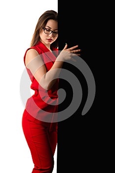 Sensual Korean girl in red suit on black and white background