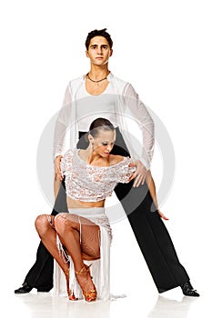 Sensual Latino dancers couple posing. Isolated