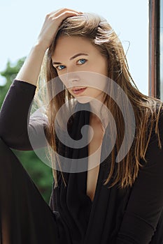 Lifestyle portrait of beautiful woman model with no makeup and clean healthy skin