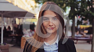 A sensual portrait of a beautiful business woman wearing glasses after a work day.