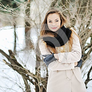 Sensual portrait of a beautiful girl in winter - outdoor