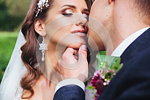 Sensual portrait of a young couple. Wedding photo outdoor