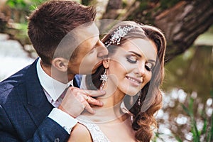 Sensual portrait of a young couple. Wedding photo outdoor