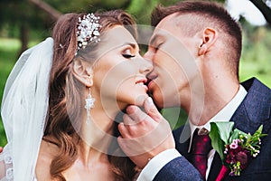 Sensual portrait of a young couple. Wedding photo outdoor