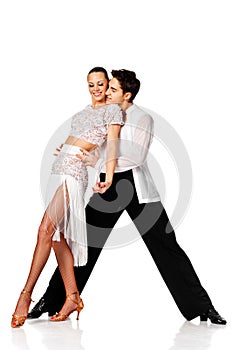 Sensual salsa dancing couple. Isolated