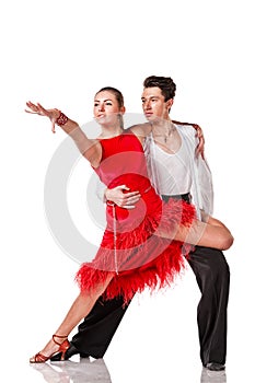 Sensual salsa dancing couple on white background