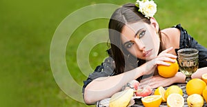 Sensual spring woman, banner for website header. Summer portrait of beautiful fashion woman with summer fruits outdoor.