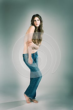 sensual topless fashion model woman in jeans