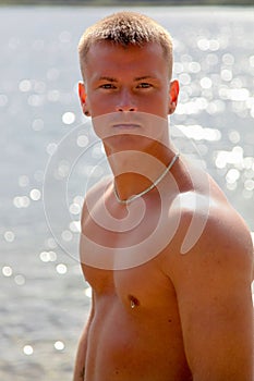 Sensual Topless Young Man On Waterside