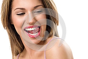 Sensual woman biting tongue