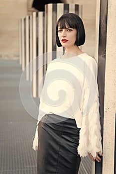 Sensual woman with brunette hair. Woman with red lips makeup in paris, france. Beauty girl with glamour look. Fashion